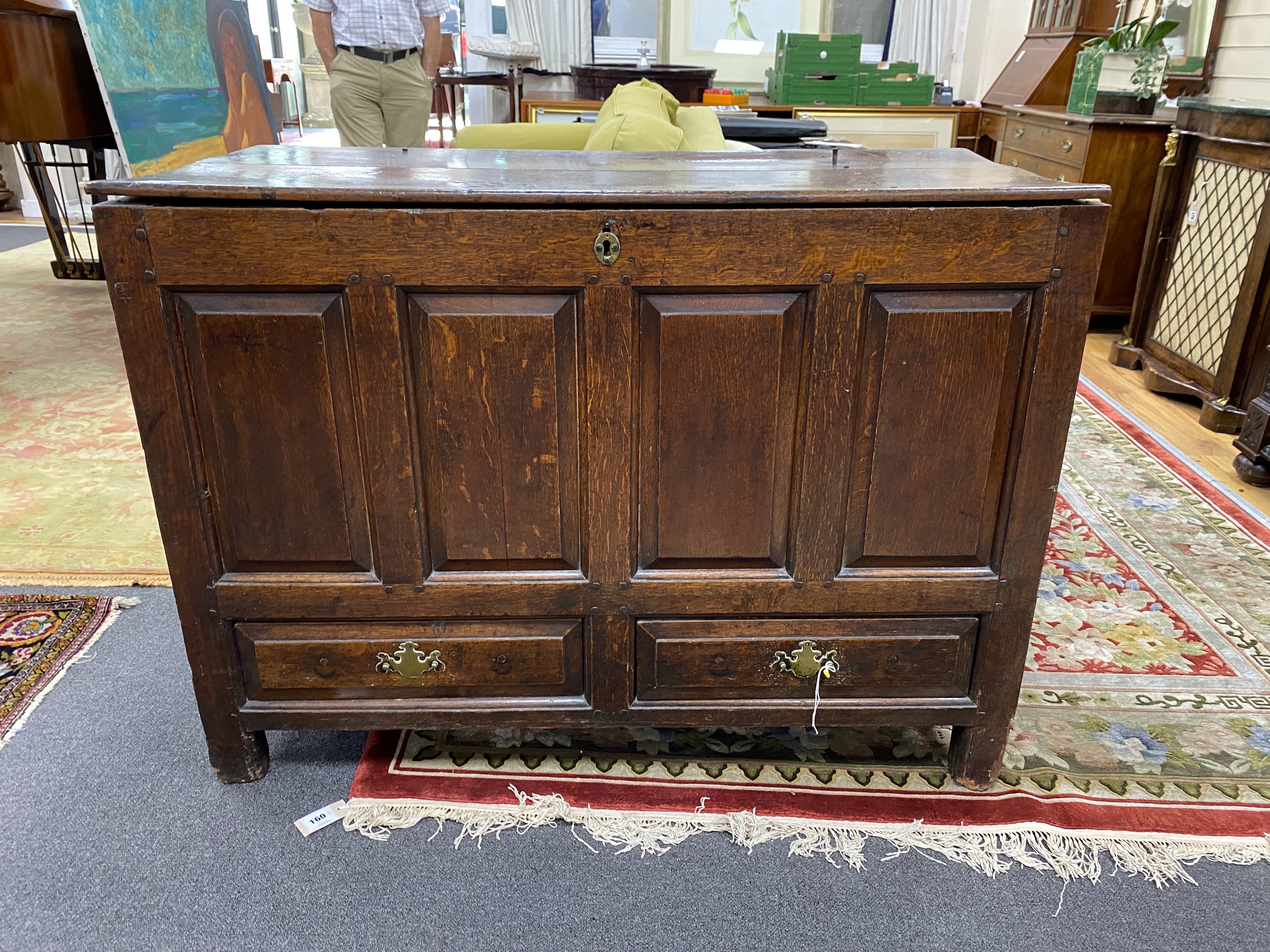 A mid 18th century oak mule chest, length 112cm, depth 53cm, height 82cm